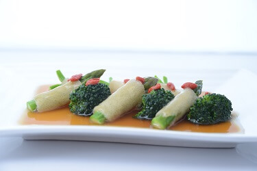 Dried bamboo fungus stuffed with baby broccoli & asparagus with superior stock dressing