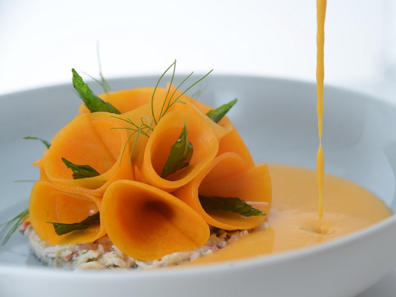 lemongrass-infused pumpkin velouté with crab salad & pickled squash