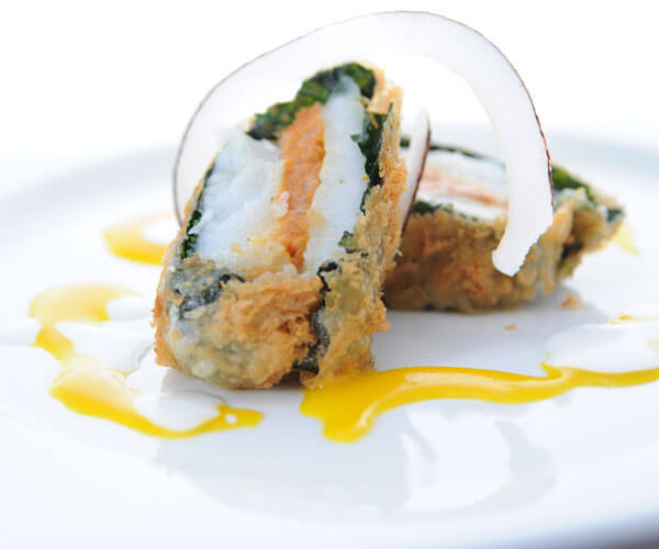 Crispy cod fillet stuffed with spicy coconut prawn paste & passion fruit coconut dressing