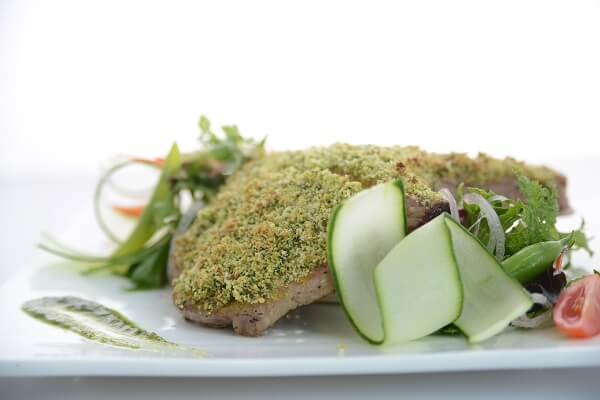 U S herb crusted pork chop with green