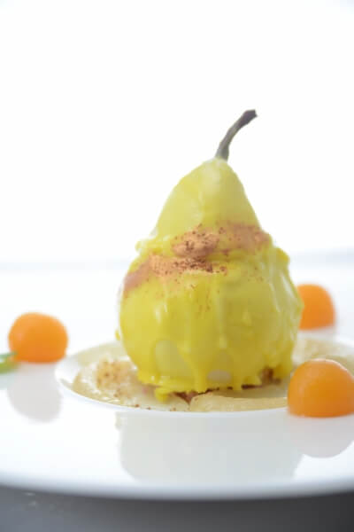 Yellow Chocolate-coated Pear with Mango Sauce